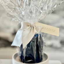 Load image into Gallery viewer, Gift-wrapped item with a bow and tag on a white surface