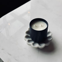 Load image into Gallery viewer, Black candle in a decorative holder on a marble surface
