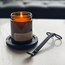 Load image into Gallery viewer, black wood coaster with brass inlay

