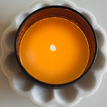 Load image into Gallery viewer, Candle in a decorative holder on a white surface

