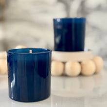Load image into Gallery viewer, Two blue candles on a surface with a blurred background
