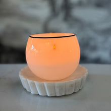 Load image into Gallery viewer, Ceramic candle holder with a lit candle on a marble surface, blurred background
